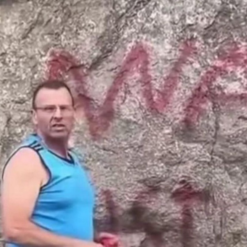 Chofer de empresa pampeana escrachado pintando un grafiti en el Parque Nacional Nahuel Huapi